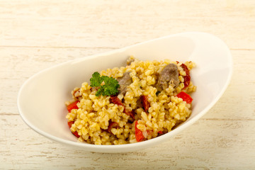 Bulgur with chicken hearts
