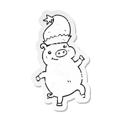 distressed sticker of a cartoon happy christmas pig