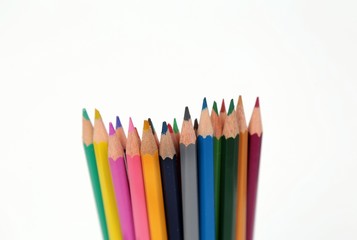 Colour pencils isolated on white background close up 