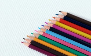 Colour pencils isolated on white background close up 