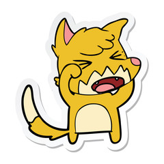 sticker of a angry cartoon fox rubbing eyes