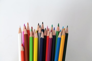 Colour pencils isolated on white background close up 
