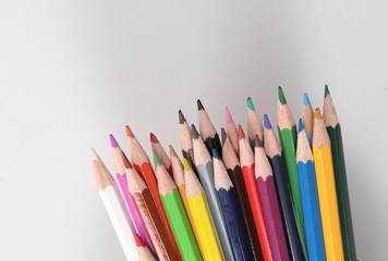 Colour pencils isolated on white background close up 