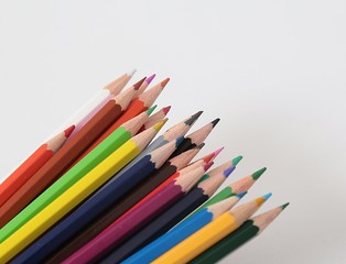 Colour pencils isolated on white background close up 