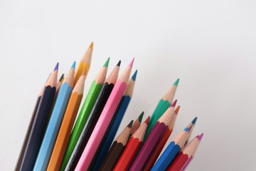 Colour pencils isolated on white background close up 