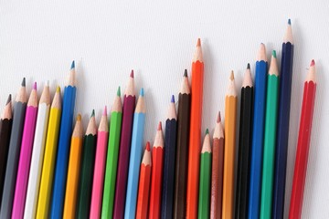 Colour pencils isolated on white background close up 