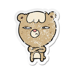 distressed sticker of a cartoon angry bear