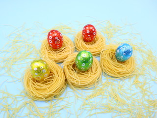 Obraz na płótnie Canvas Funny Easter Composition with Nest Pasta