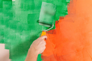 Hand painting surface in green and orange colors