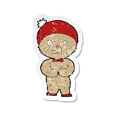 retro distressed sticker of a cartoon teddy bear