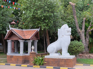 white statue of a lion, ornamental vegetation, Asian culture