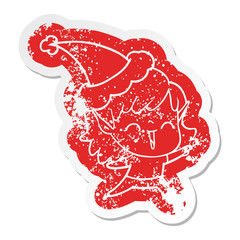 cartoon distressed sticker of a elf girl wearing santa hat