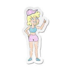 retro distressed sticker of a happy gym woman giving thumbs up symbol