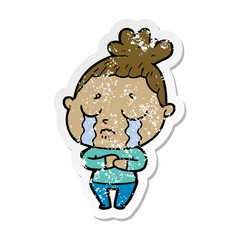 distressed sticker of a cartoon crying woman