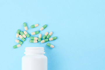 Medicine, capsule on green background