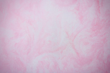 ピンクのマーブリングのある背景紙