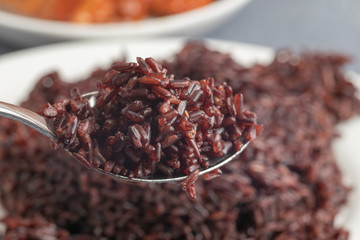 close up of steamed riceberry rice on plate