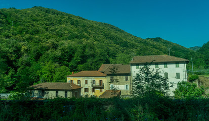 Fototapeta na wymiar Italy,La Spezia to Kasltelruth train, a house with bushes in front of a building