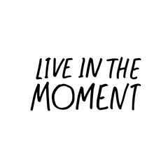 Live in the moment phrase. Hand drawn brush style modern calligraphy.