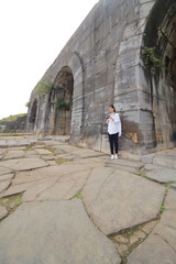 woman traveling to Ho citadel in Thanh Hoa,Vietnam