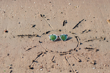 Sun drawing in the sand 