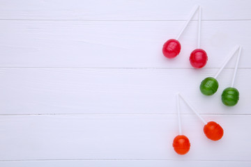 Naklejka na ściany i meble Lollipops on white background. sweet candy concept
