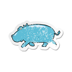retro distressed sticker of a cartoon hippopotamus