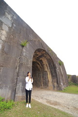 woman traveling to Ho citadel in Thanh Hoa,Vietnam