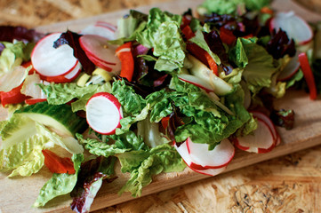 .fresh salad of chopped vegetables and lettuce