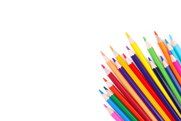 Many different colored pencils islolated on white background