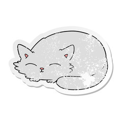 distressed sticker of a cartoon cat sleeping