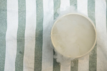 Dry ice smoke or liquid nitrogen in bowl