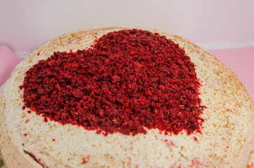 Red velvet cake with a heart on top of it 