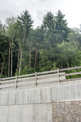Italy,La Spezia to Kasltelruth train, a tree next to a fence