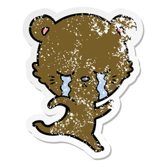 distressed sticker of a crying cartoon bear