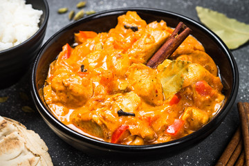 Chicken tikka masala with rice.