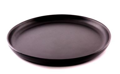 Top view of empty plate on white background.