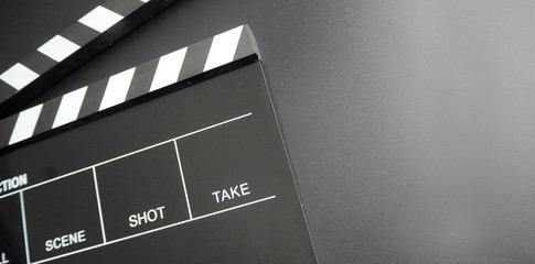 Fototapeta na wymiar Clapper board or movie slate use in video production or movie and cinema industry. It's black color.