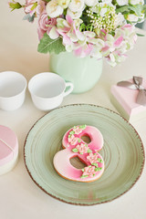 Gingerbreads for March 8 in the bright kitchen with flowers