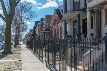 A Row of Fenced In Homes in Logan Square Chicago