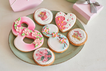 Gingerbreads for March 8 in the bright kitchen with flowers