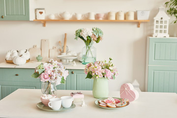 Gingerbreads for March 8 in the bright kitchen with flowers