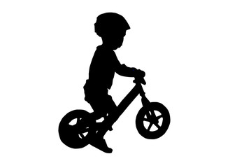 Obraz na płótnie Canvas Silhouette Balance Bike for kids. This Boy practicing balance With a bicycle using a plowed leg is a bike without a spinning ladder.
