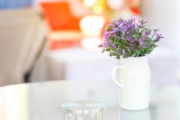 flower vase on glass table