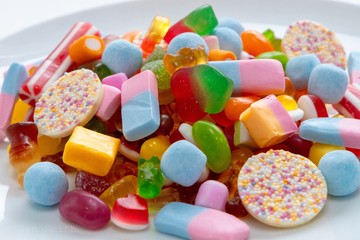Fototapeta na wymiar colorful candies on white background