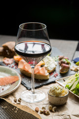 glass of wine with a variety of snacks. Georgian menu, Georgian restaurant