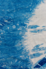 The fabric indigo tie dye as a background and texture.