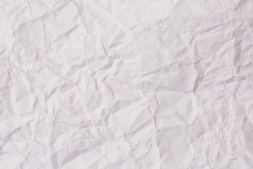 Paper crumple with the texture of the surface,White creased paper texture for abstract background..