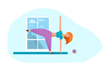 redhead girl doing yoga by the window