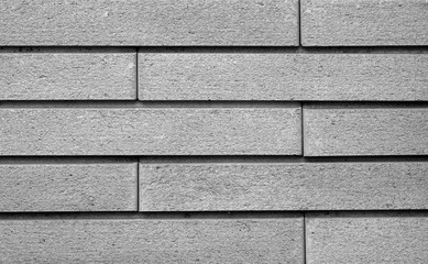 Decorative brick wall in black and white.